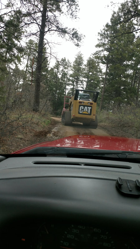 Tracking into a job site in the Rampart Range CO